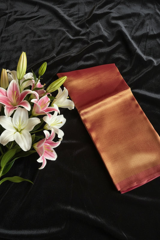 Brown and red fabric on a white surface